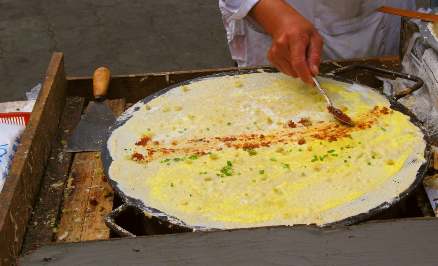 dan bing being cooked